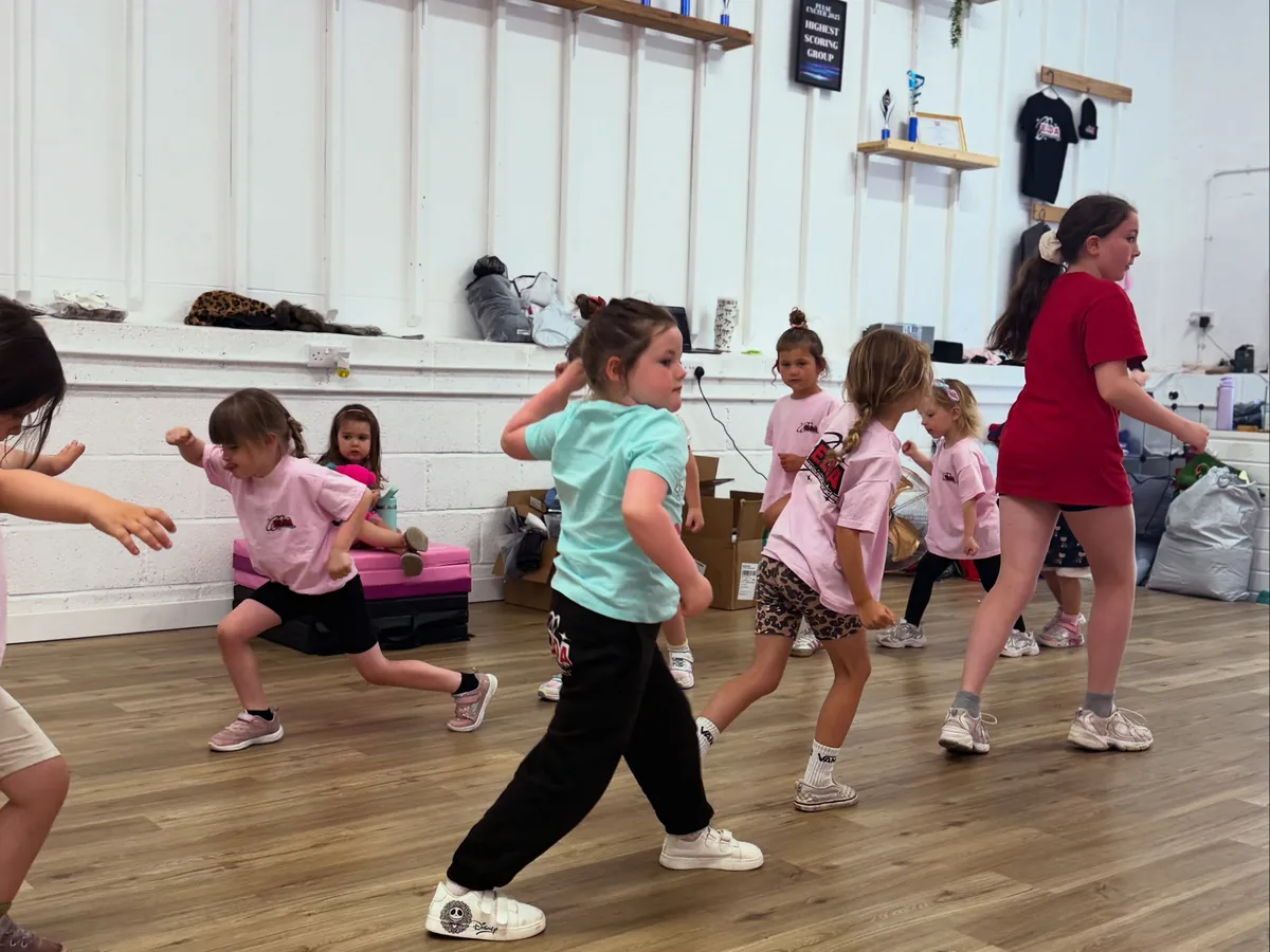 A junior class moving across the floor